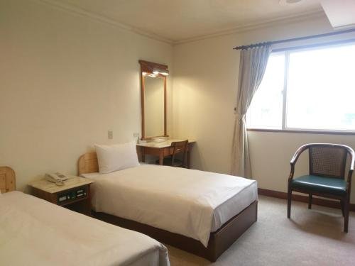 Фото Puyisy Business Hotel