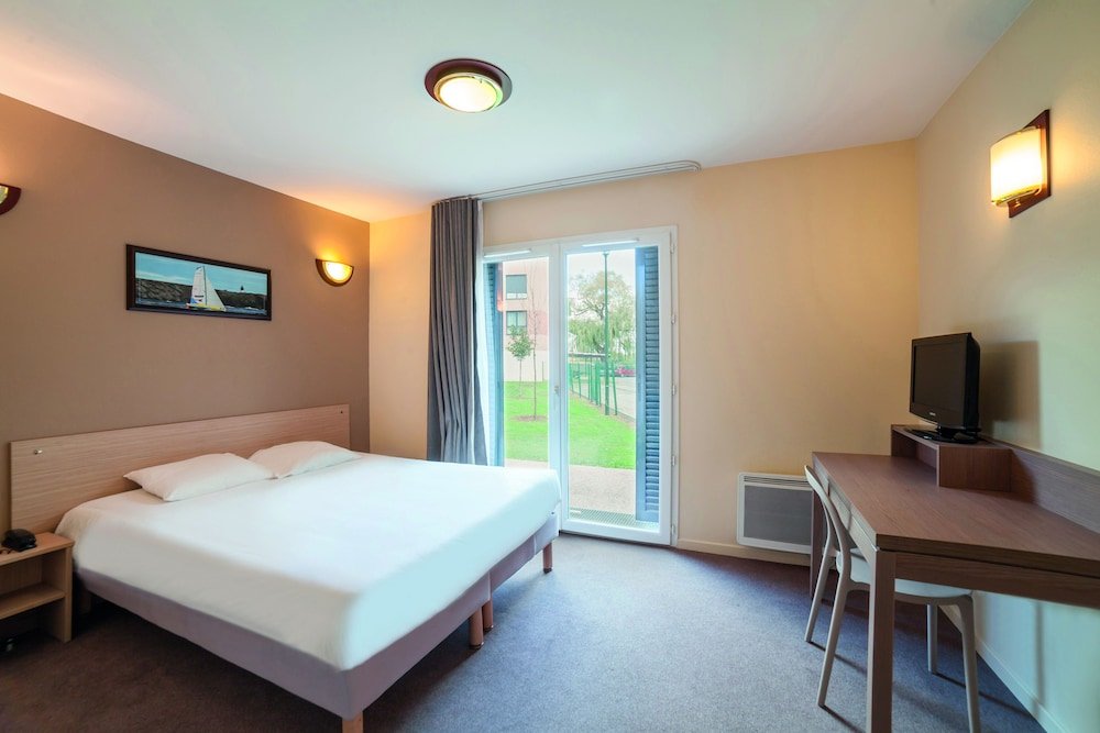 Фото Zenitude Hôtel - Résidences Magny les Hameaux