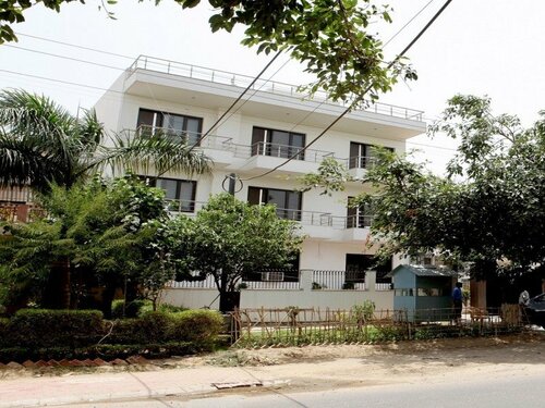 Внешний вид отеля Hollyhocks Residency в Гургаоне, фото 3