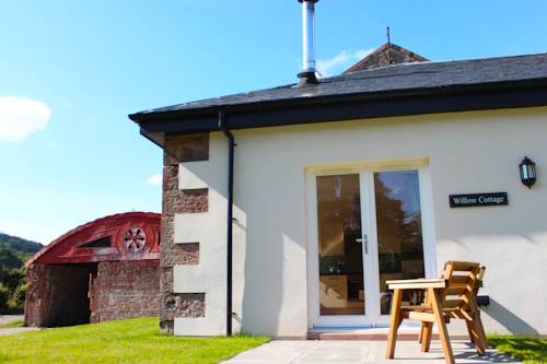 Фото Auchendennan Luxury Self Catering Cottages