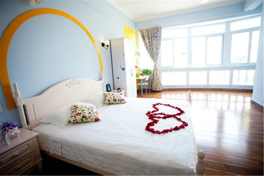 Фото Sanya Homey Hotel