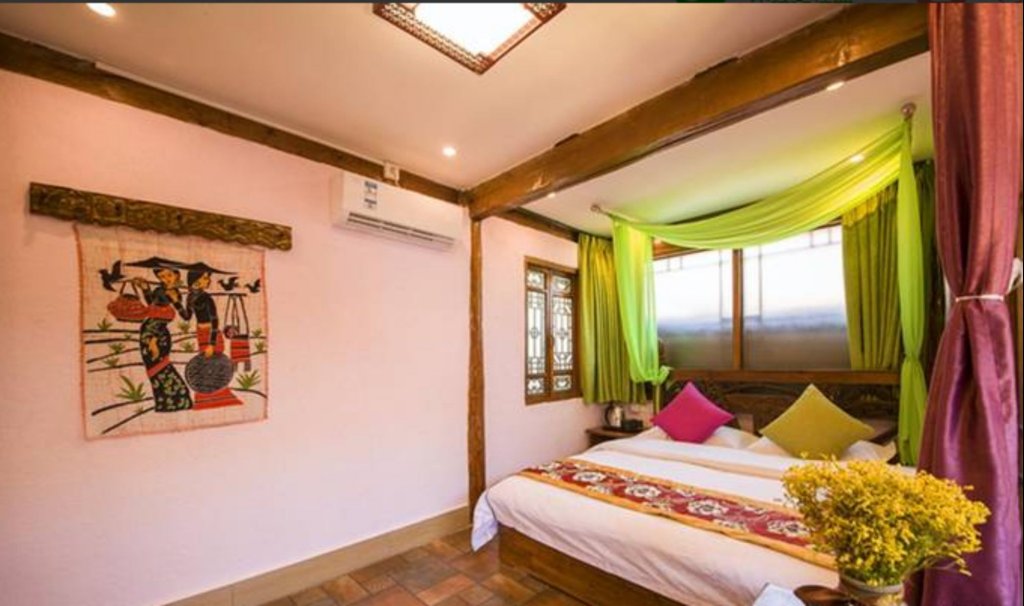 Фото Lijiang Yunfeiyang Inn