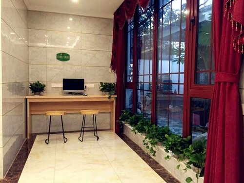 Гостиница Shell Kunshan Zhouzhuang Hotel
