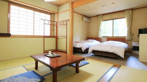 Гостиница Alpinarc Chalet Hakuba