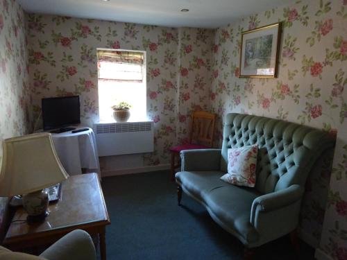 Фото The Cottage Hotel