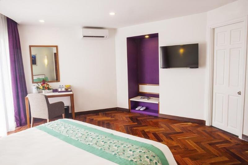 Фото Êmm Hotel Hue