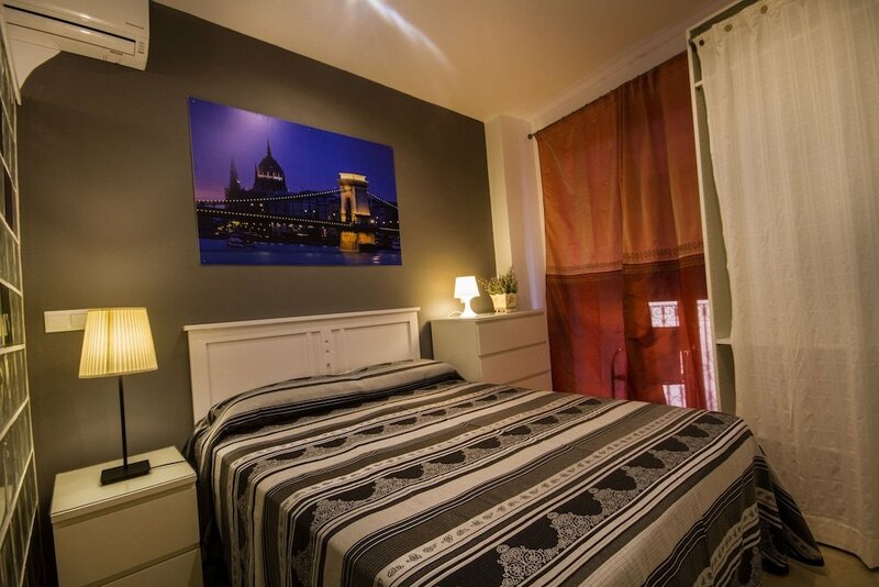Гостиница Apartamentos El Templo Suites