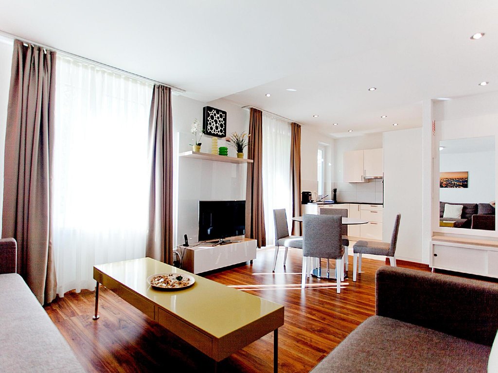 Фото Luxury Apartments by Livingdowntown