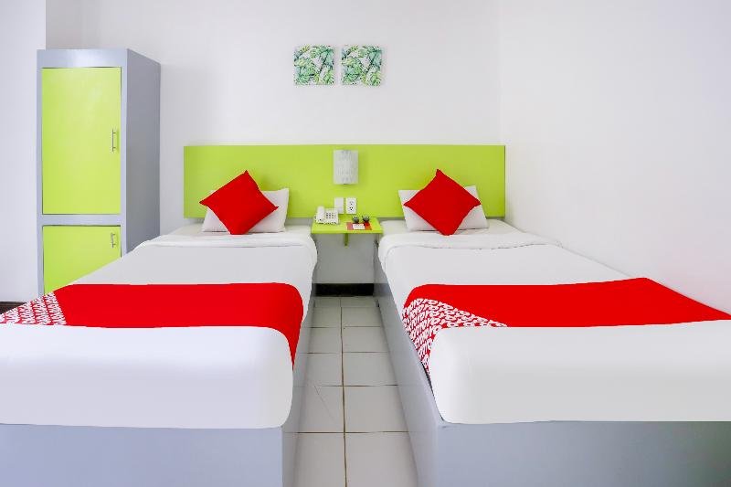 Фото Oyo 210 Apple Tree Suites