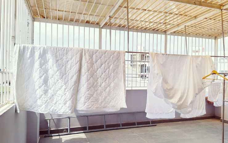 Фото Oyo 103 Airport Family Apartment