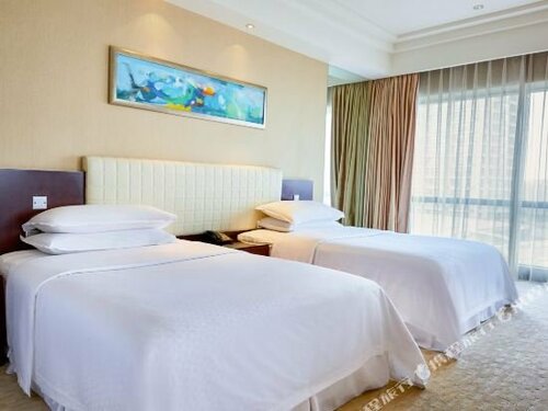 Внешний вид отеля Four Points by Sheraton Hangzhou, Binjiang в Ханчжоу, фото 5