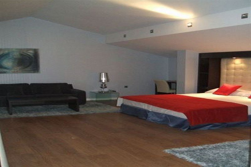 Фото La Casa de La Trinidad Hotel