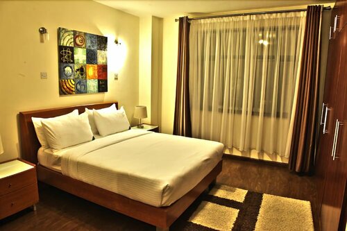 Апартаменты Golf View Serviced Apartments