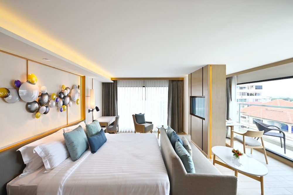 Фото M Pattaya Hotel