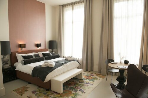 Гостиница Bossche Suites Stationsweg в Хертогенбосе
