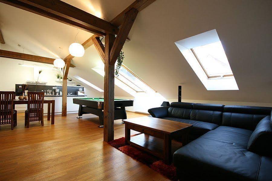 Фото Attic Klimentska Apartments