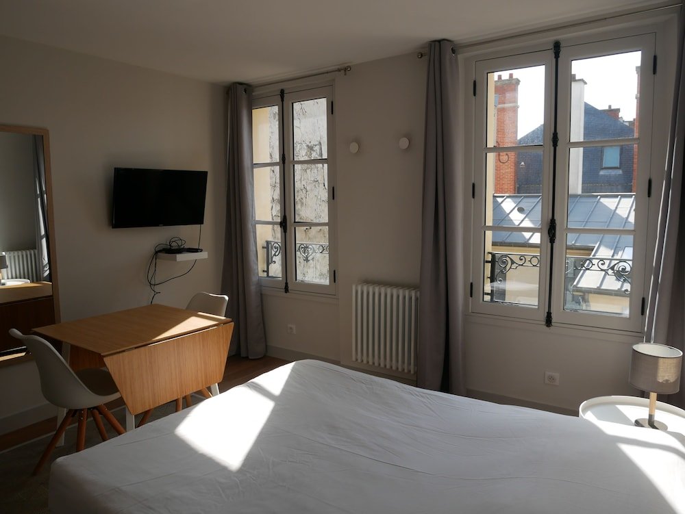 Фото Les Apparts de l'Oncle Louis