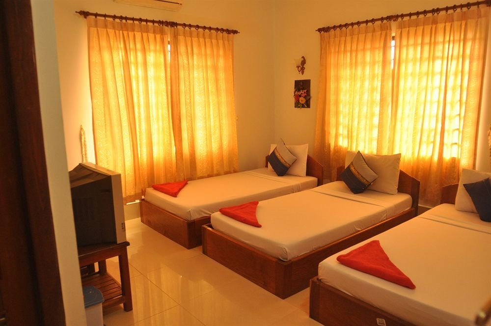 Фото Tropical Breeze Guesthouse