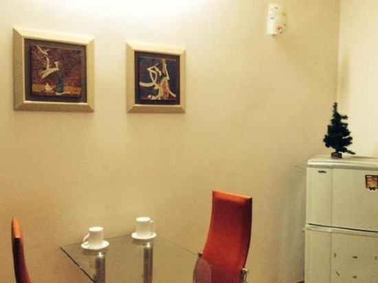 Фото Golden Horse Serviced Apartment