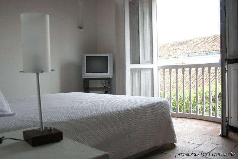 Фото Hotel El Candil de los Santos