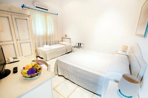 Гостиница Li Suari Club Village в Сардинии