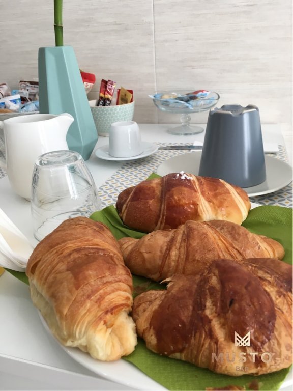 Фото Musto Suites & Rooms