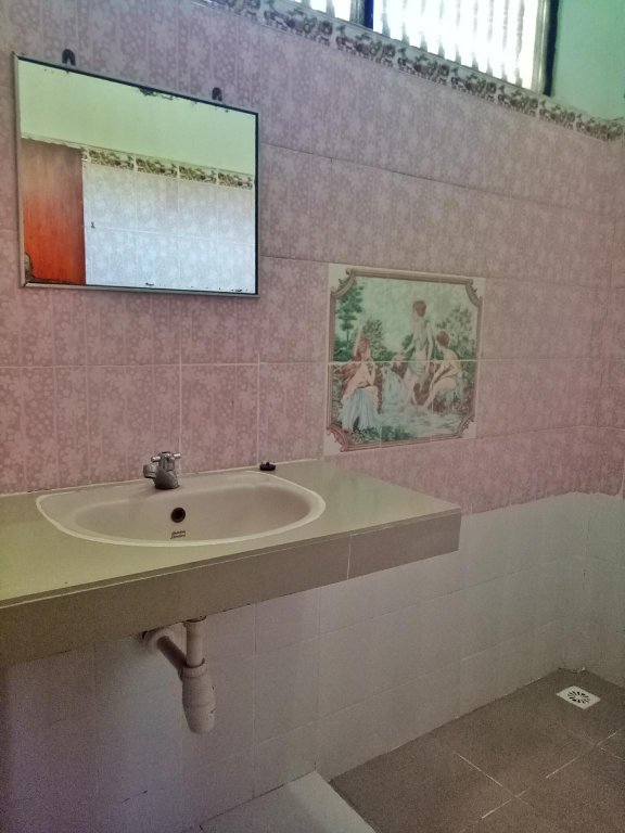 Фото Taman Mekar Beach Inn 2