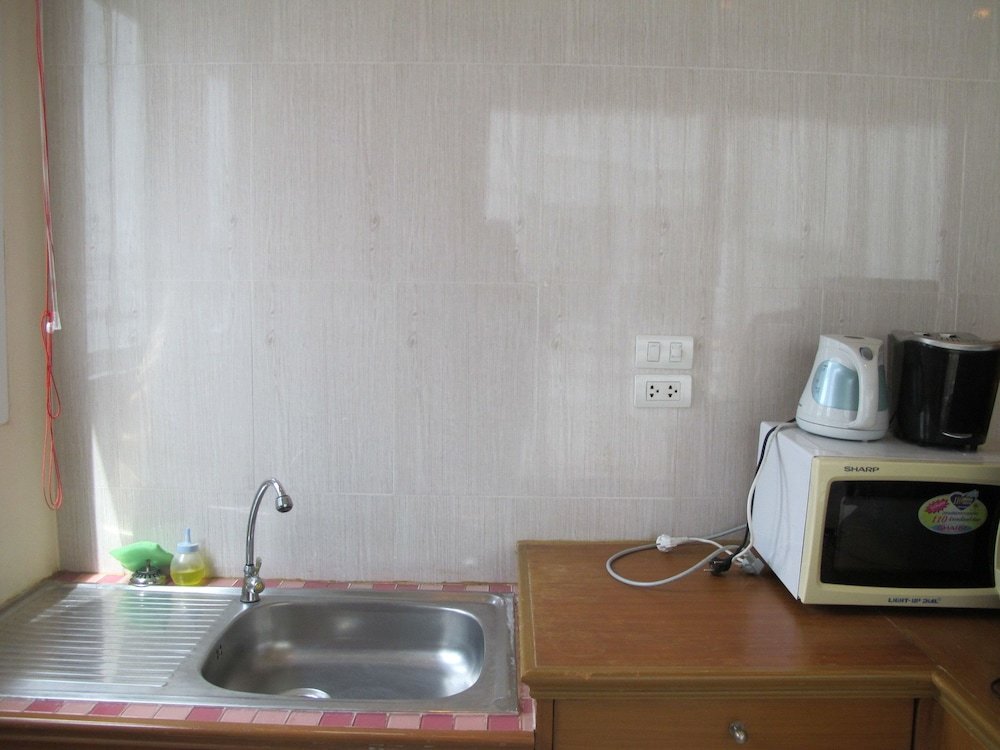 Фото Rouge Service Apartments