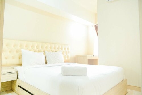 Гостиница Pool View 2br Apartment @ Springlake Summarecon в Бекаси