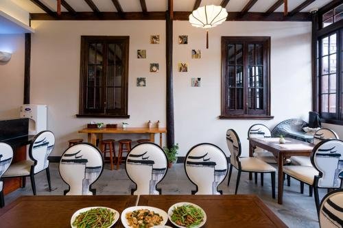 Фото Yi Garden Cultural Hotel Disney Branch