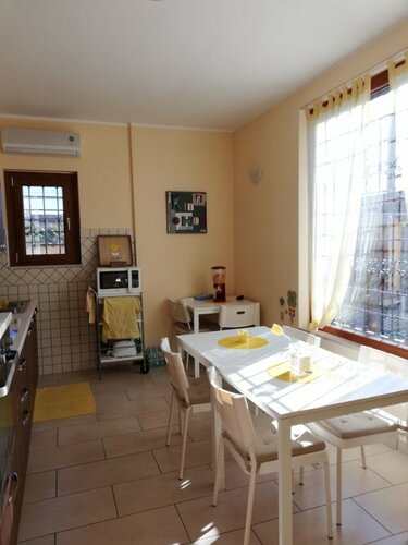 Гостевой дом The Yellow House в Фьюмичино