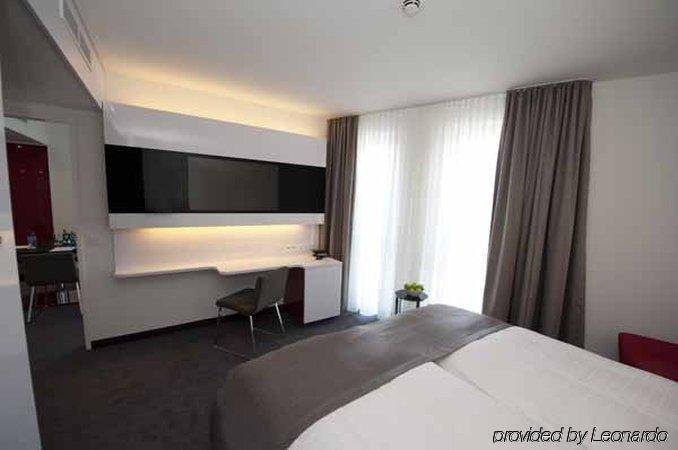 Фото Dormero Hotel Frankfurt Messe