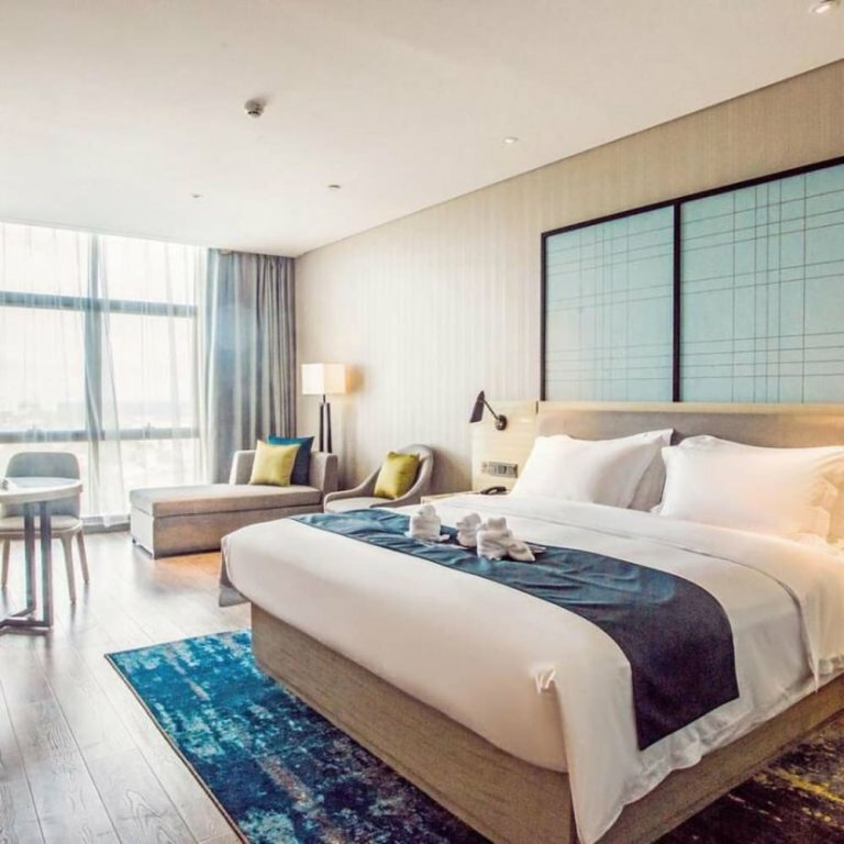 Гостиница Echarm Hotel Qionghai Wanquanhe Branch
