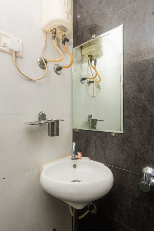 Фото Oyo 24050 Hotel Sweet Dream