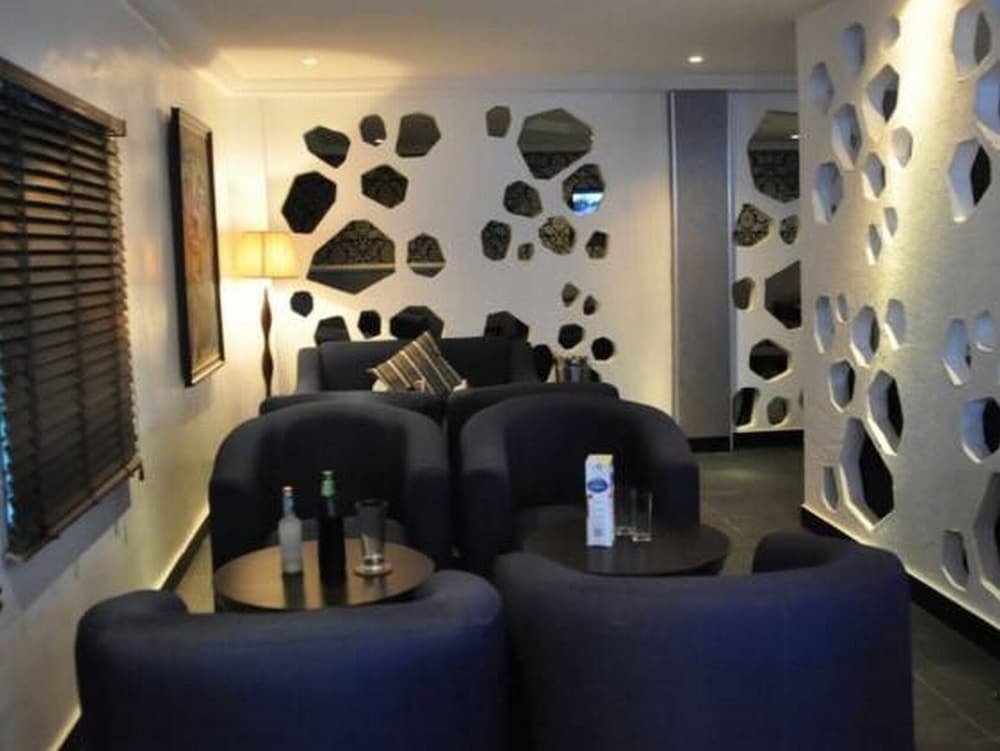 Фото De Brass Suites Hotel