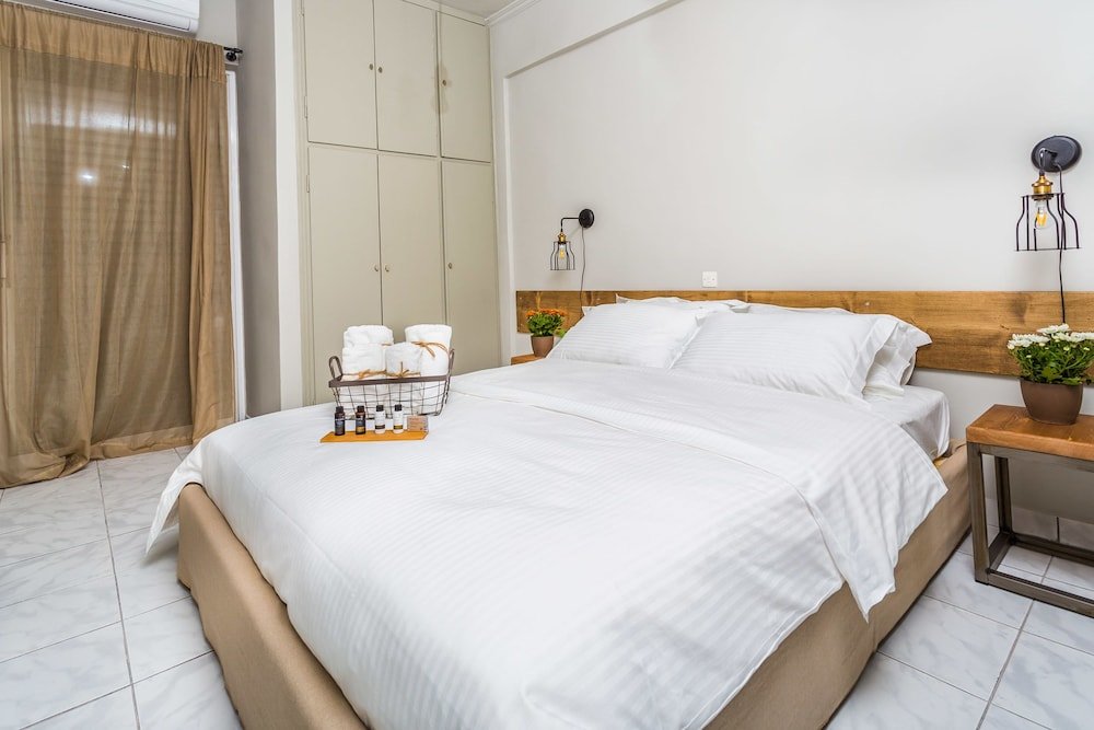 Фото Aris Athens Suites