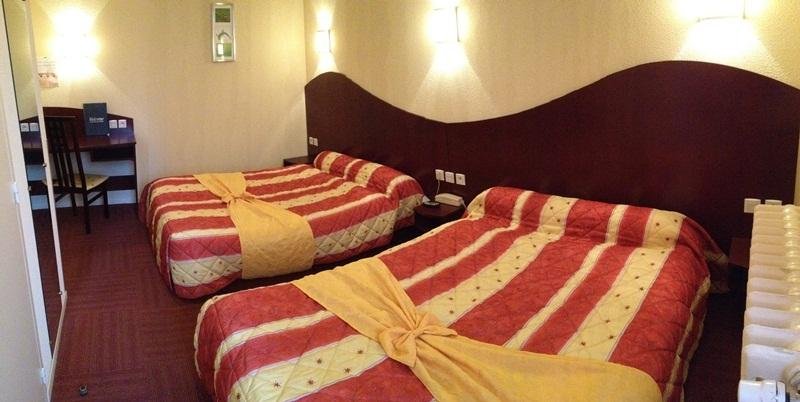 Фото Hôtel Les Commerçants