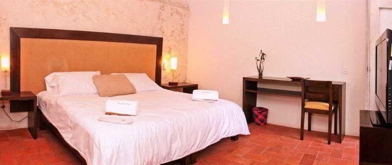 Фото Hotel El Candil de los Santos