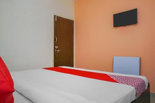 Фото Oyo 16053 Ema Happy Stay