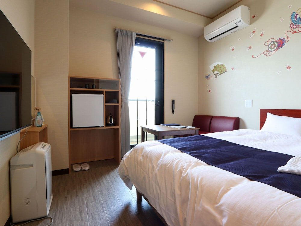 Фото Hotel Kanade Kankukaizuka