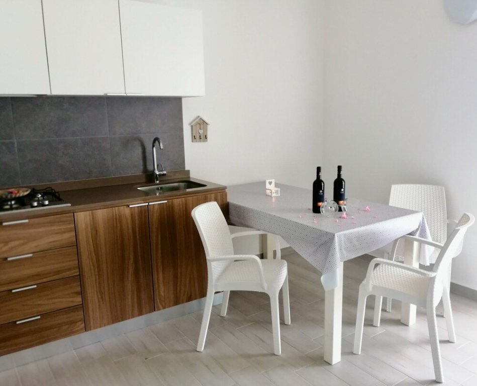 Фото Midenza Suites & Residence