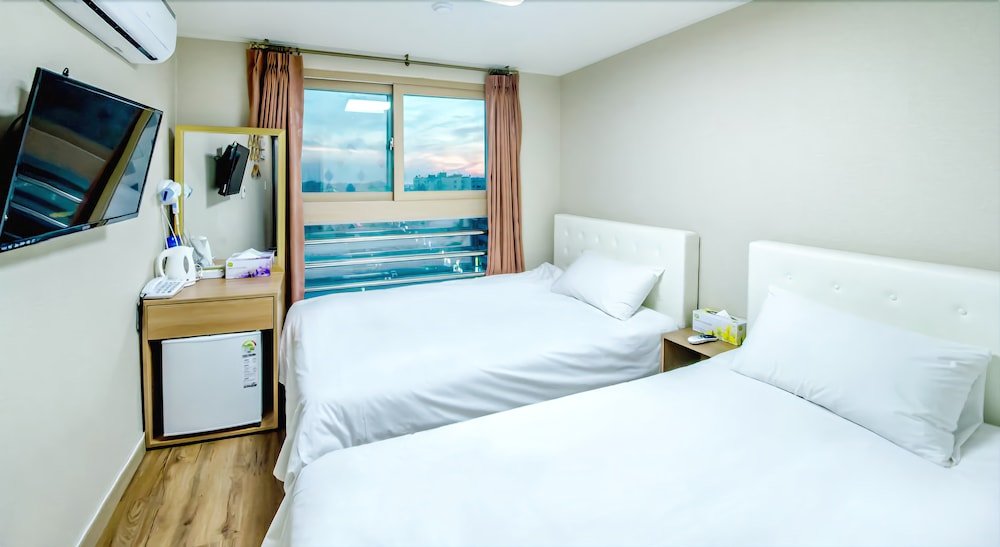 Фото Jeju Skyhill Business Hotel