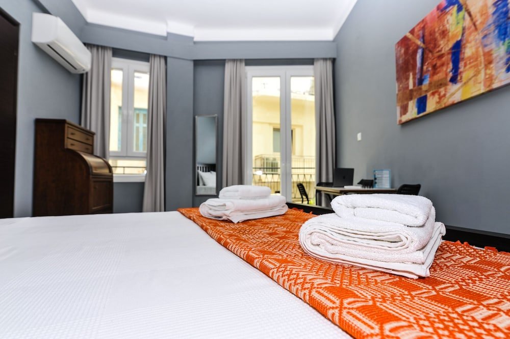 Фото The Central Boutique Αpartments