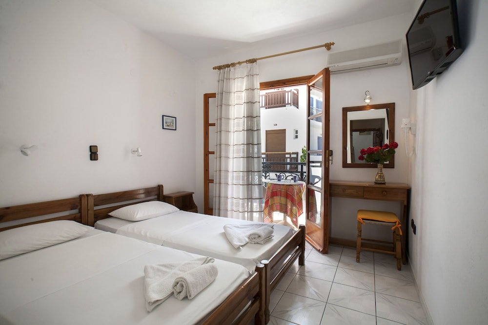 Фото Kapetanos Rooms