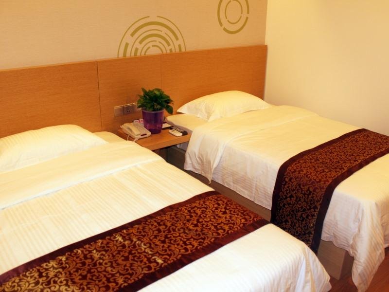 Фото GreenTree Inn Tianjin Xiqing District Xiuchuan Road Sunshine 100 Express Hotel