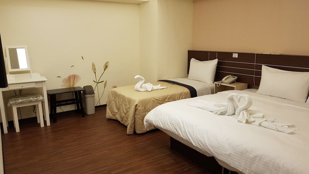 Фото Jhong-Sing Hotel