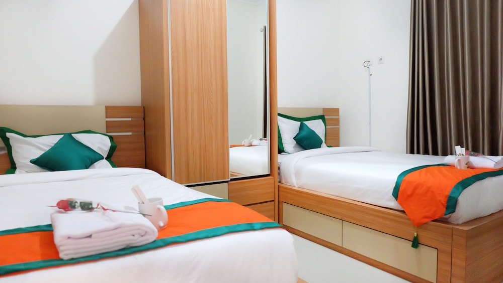 Фото Simply Homy Guest House Unit Bintaran