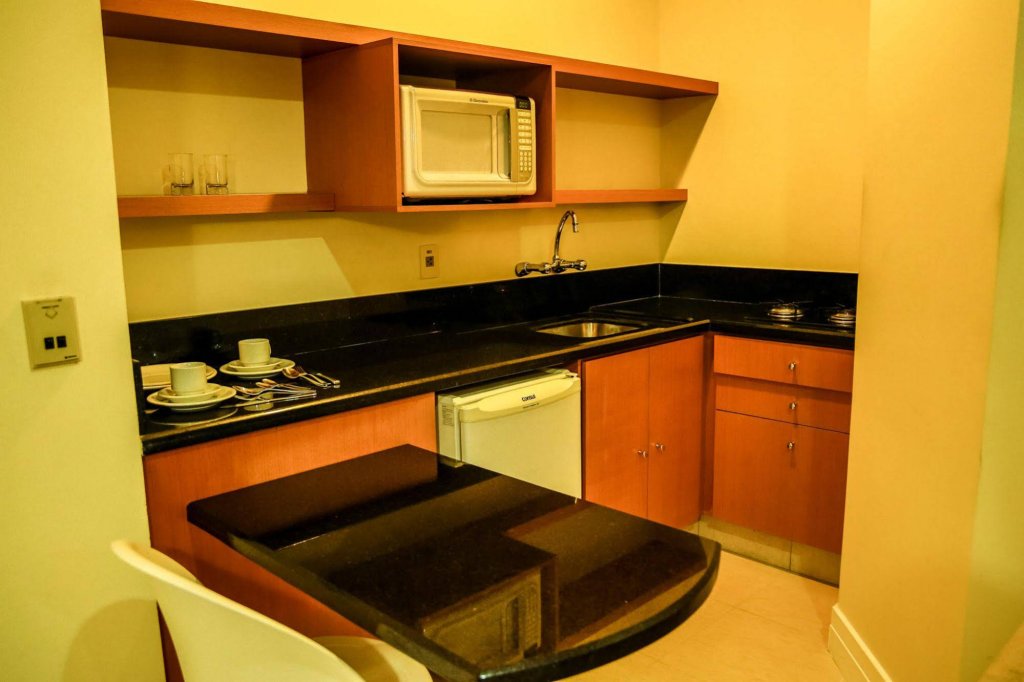 Фото Le Village Flats Hotel e Business