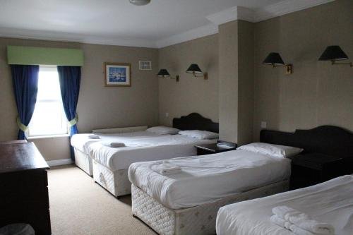 Фото Kilkenny Inn Hotel