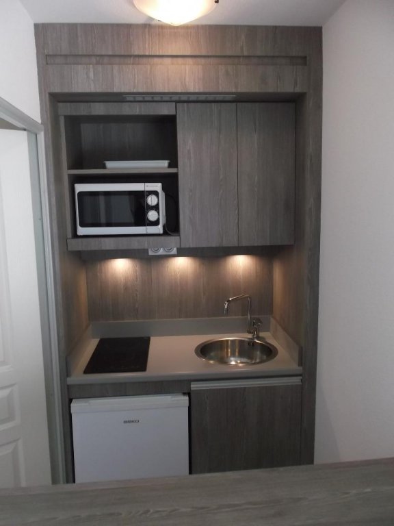 Фото Séjours & Affaires Clermont Ferrand Park République